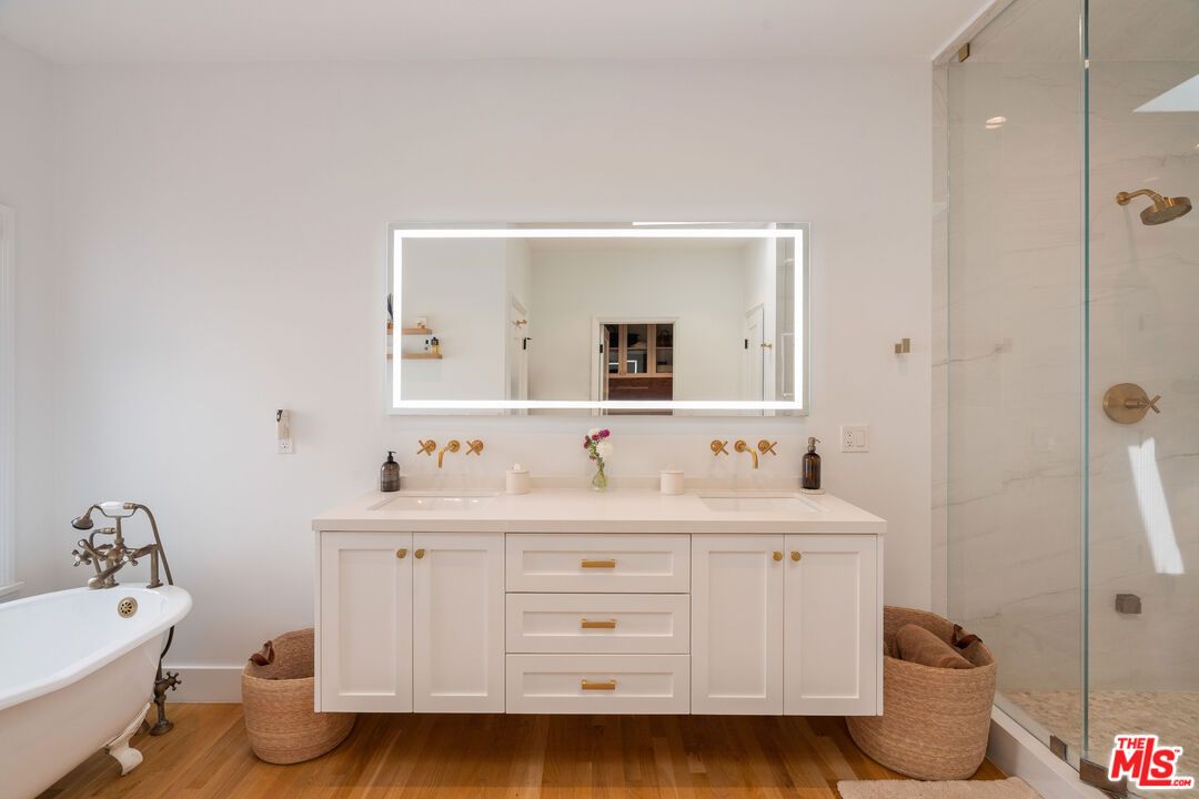 Bathroom, Dual Sink Vanities, Free Standing Baths, Glass Shower, Interior, Marble Walls, Wood Texture Flooring