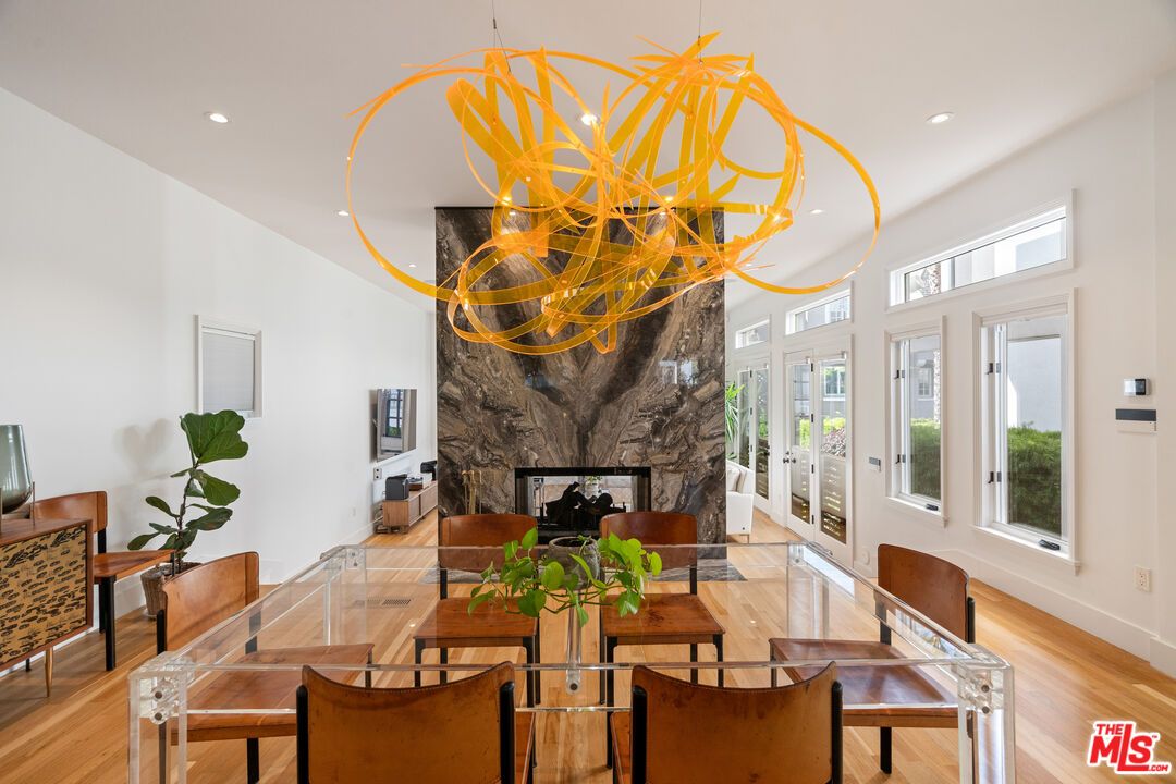 Dining room, Fireplace, Interior, Living room, Pendant Lights, Recessed Lighting, Wood Texture Flooring