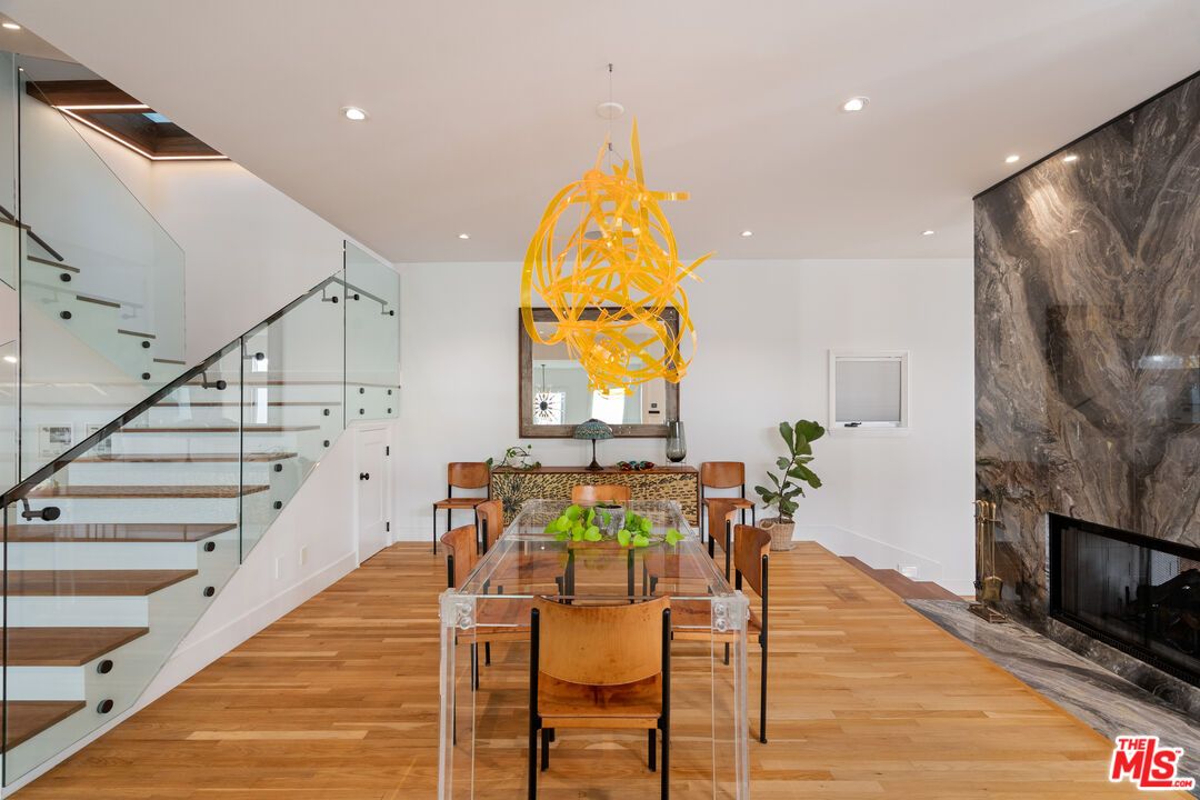 Dining room, Fireplace, Interior, Pendant Lights, Recessed Lighting, Wood Texture Flooring