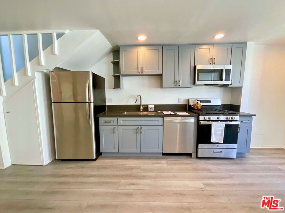 Interior, Kitchen, Recessed Lighting, Stainless Steel Appliances, Wood Texture Flooring