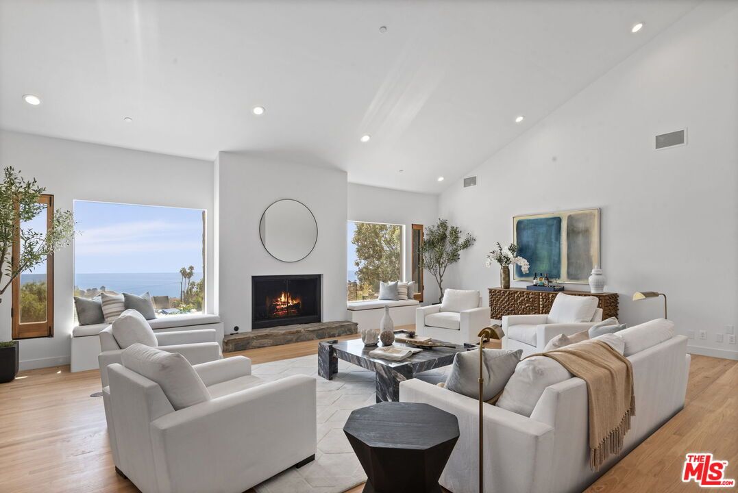 Fireplace, Interior, Living room, Recessed Lighting, Water, Wood Texture Flooring