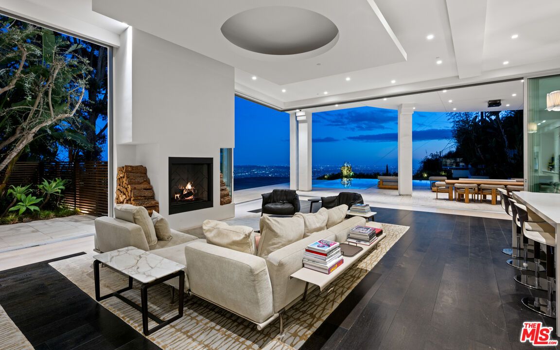 Fireplace, Interior, Living room, Recessed Lighting, Water, Wood Texture Flooring