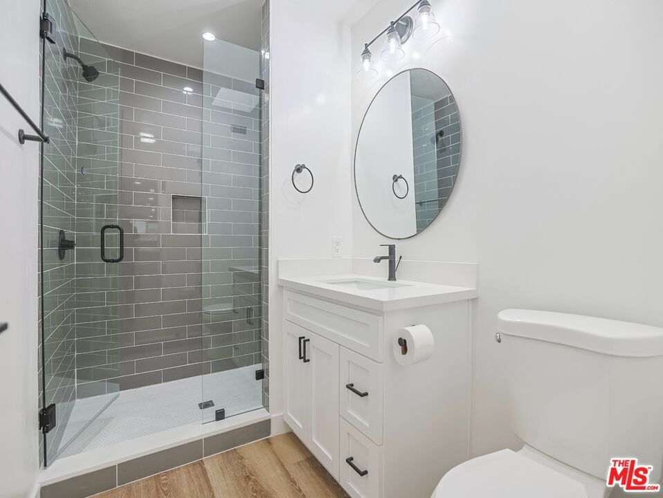 Bathroom, Glass Shower, Interior, Recessed Lighting, Wood Texture Flooring