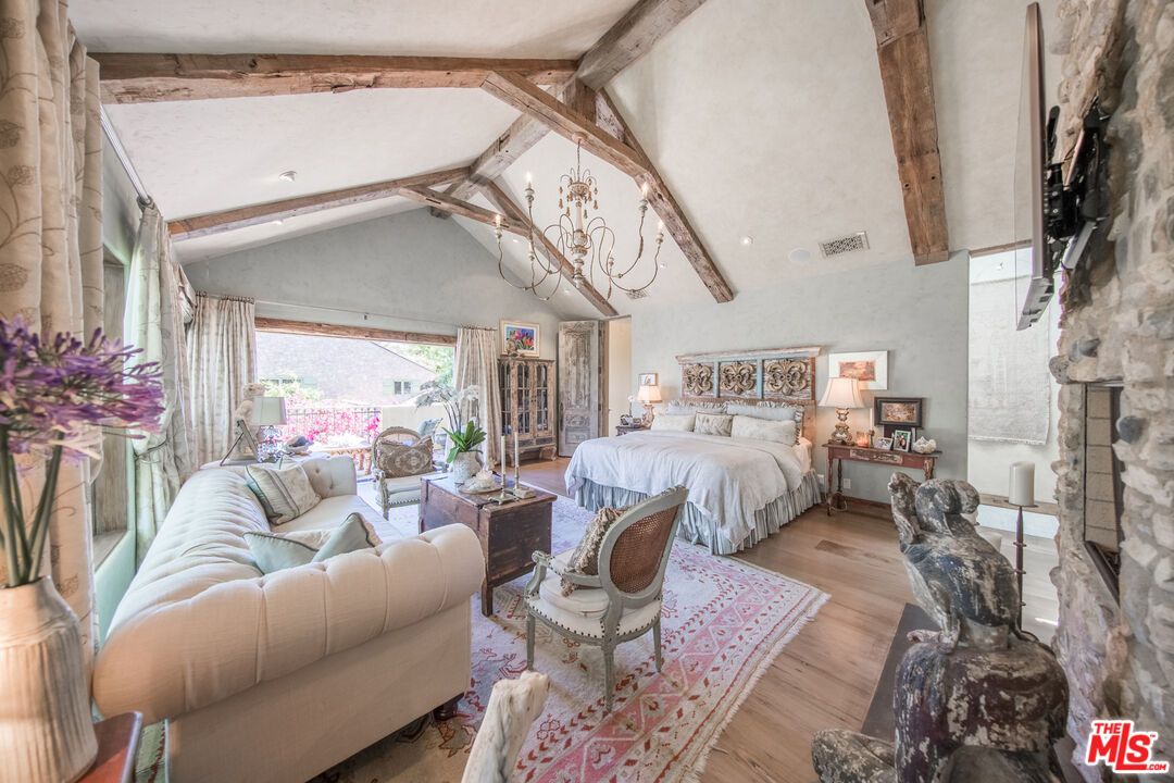 Bedroom, Chandelier, Fireplace, Interior, Recessed Lighting, Wooden Beams, Wood Texture Flooring