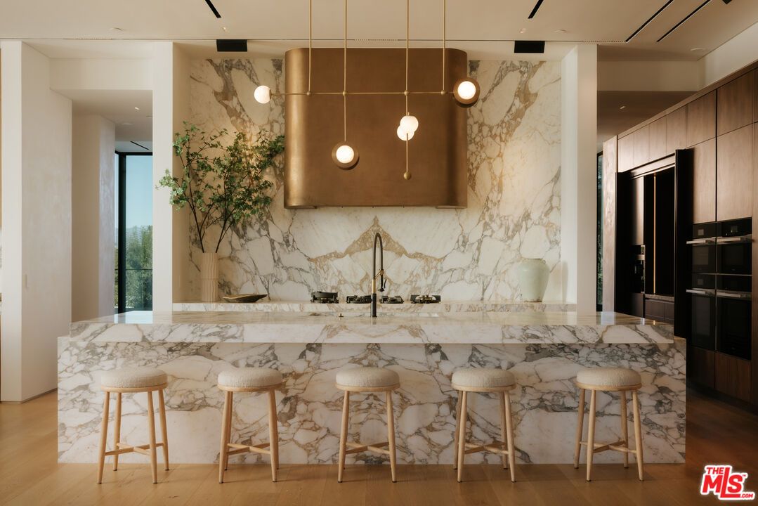 Interior, Kitchen, Marble Walls, Pendant Lights, Recessed Lighting, Wood Texture Flooring