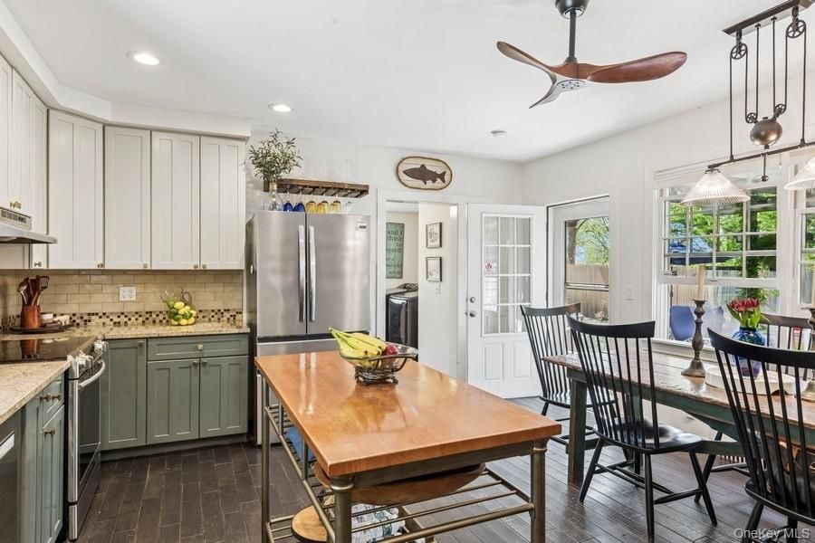 Dining room, Interior, Kitchen, Pendant Lights, Recessed Lighting, Stainless Steel Appliances, Wood Texture Flooring