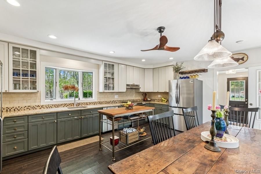 Dining room, Interior, Kitchen, Recessed Lighting, Stainless Steel Appliances, Wood Texture Flooring