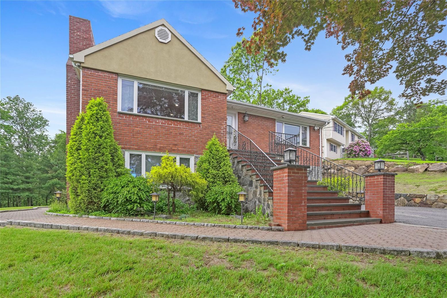 Exterior, Facade, Brick Facade, Raised Ranch