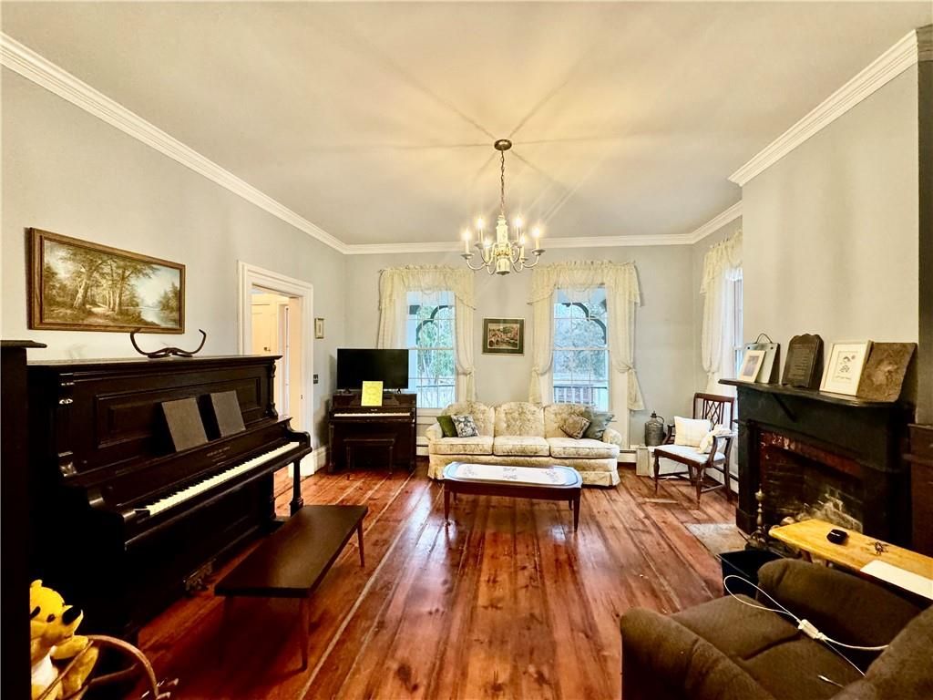 Chandelier, Fireplace, Interior, Living room, Piano, Wood Texture Flooring