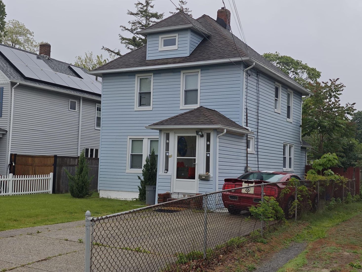 Exterior, Facade, Solar Panels, American Foursquare