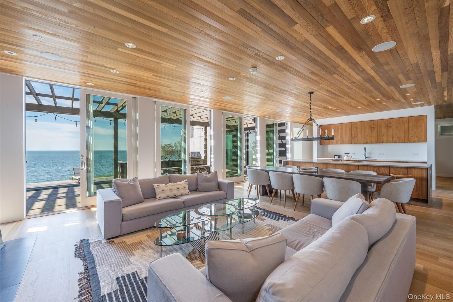 Dining room, Interior, Kitchen, Living room, Pendant Lights, Recessed Lighting, Water, Wooden Ceilings, Wood Texture Flooring