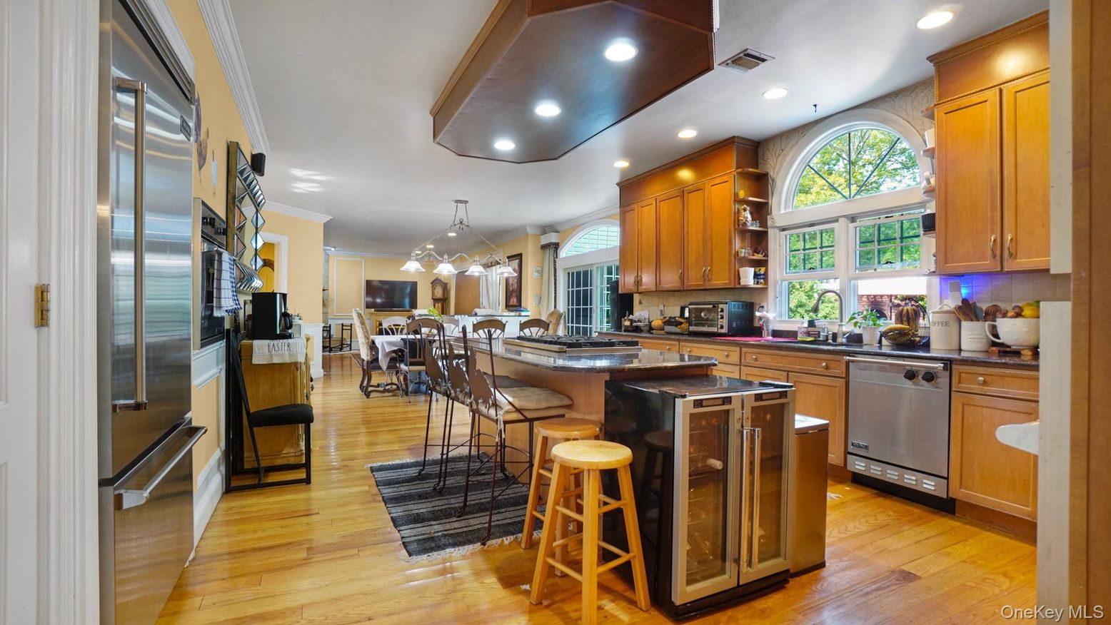 Dining room, Interior, Kitchen, Pendant Lights, Recessed Lighting, Stainless Steel Appliances, Wood Texture Flooring