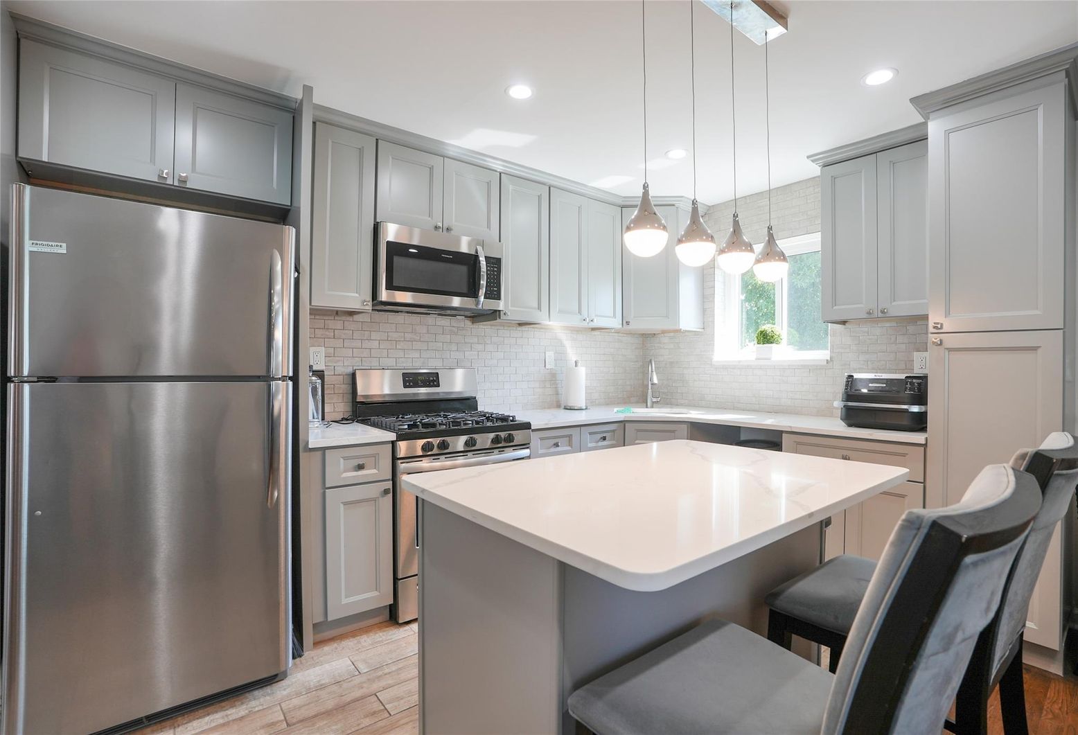 Interior, Kitchen, Pendant Lights, Recessed Lighting, Stainless Steel Appliances, Wood Texture Flooring
