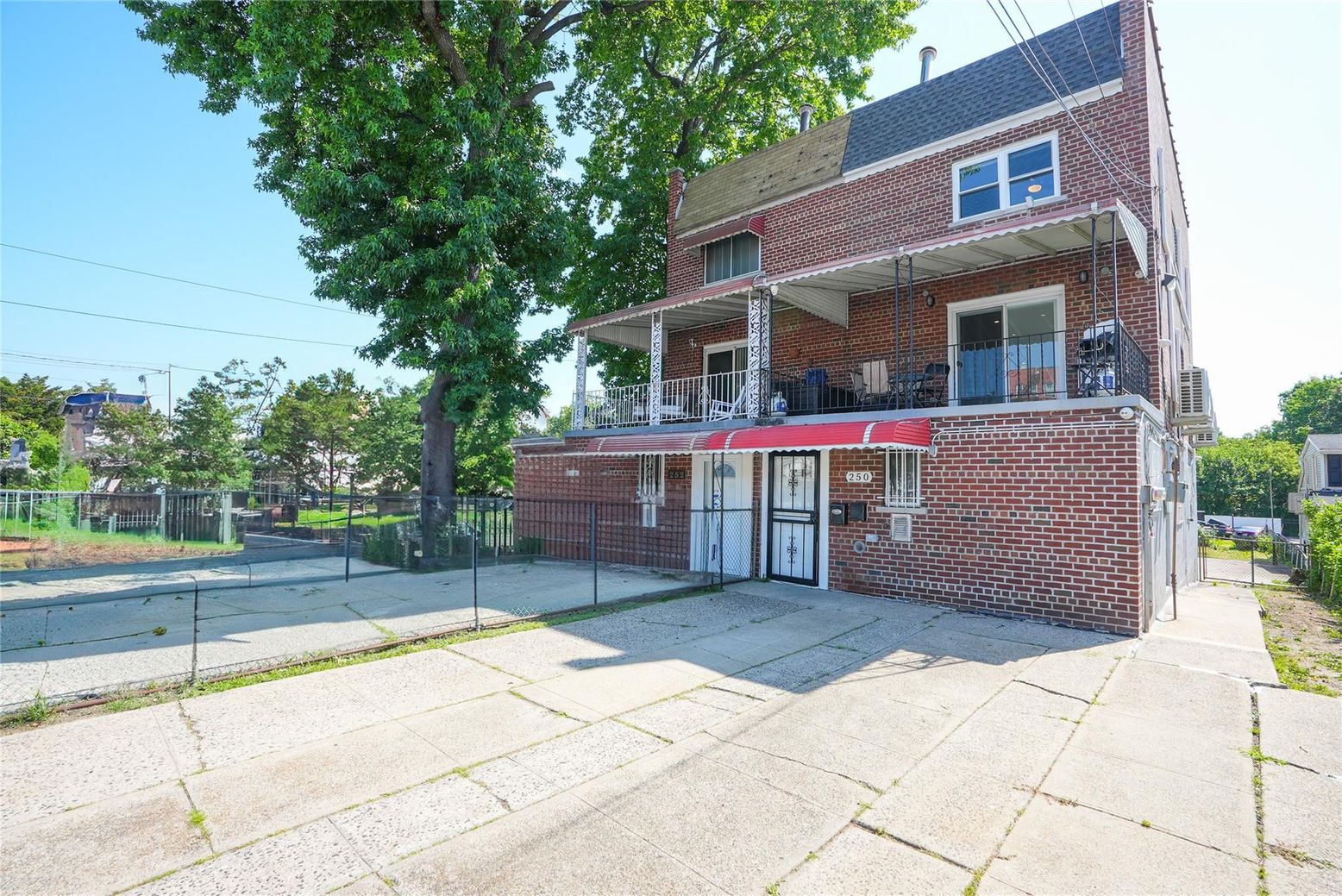 Exterior, Facade, Brick Facade, American Foursquare