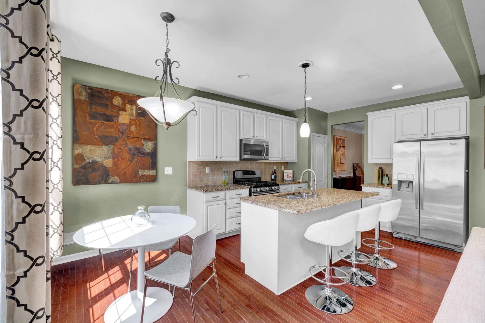 Dining room, Interior, Kitchen, Pendant Lights, Recessed Lighting, Stainless Steel Appliances, Wood Texture Flooring