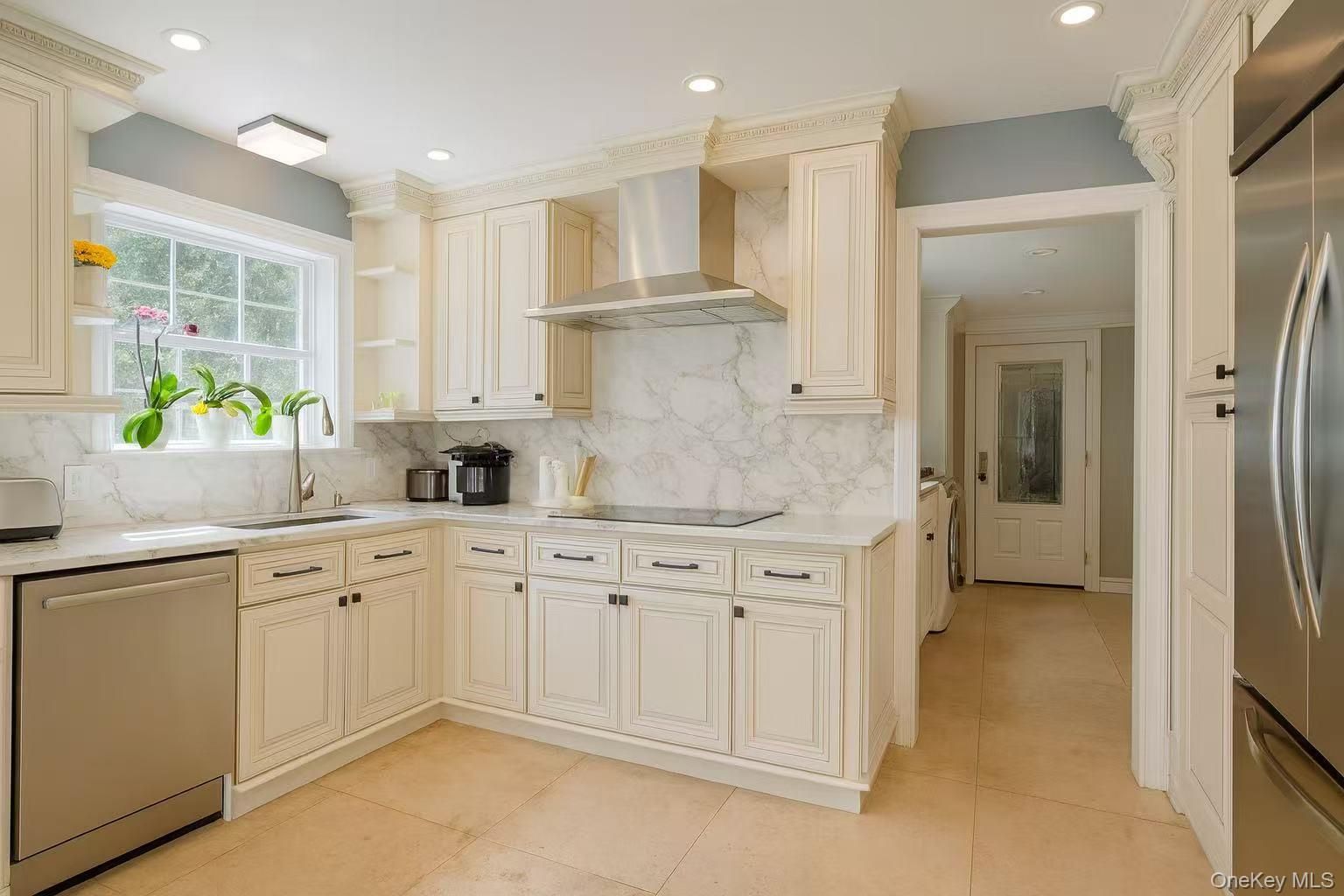 Interior, Kitchen, Marble Walls, Recessed Lighting, Stainless Steel Appliances
