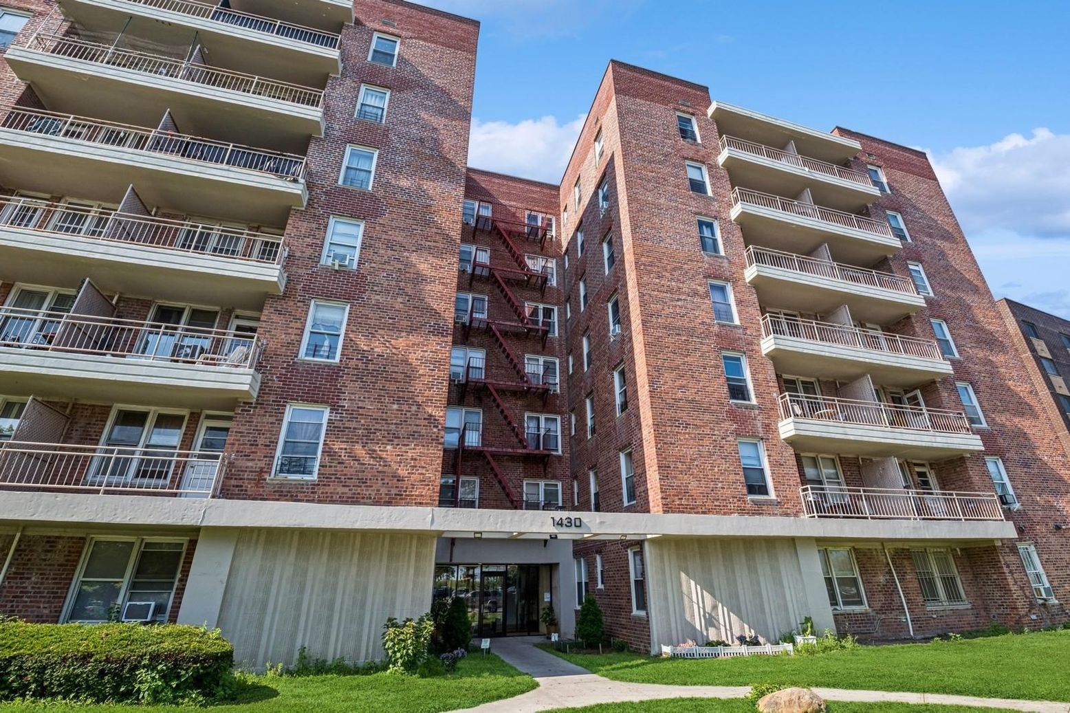 Exterior, Facade, Brick Facade, Condo Building