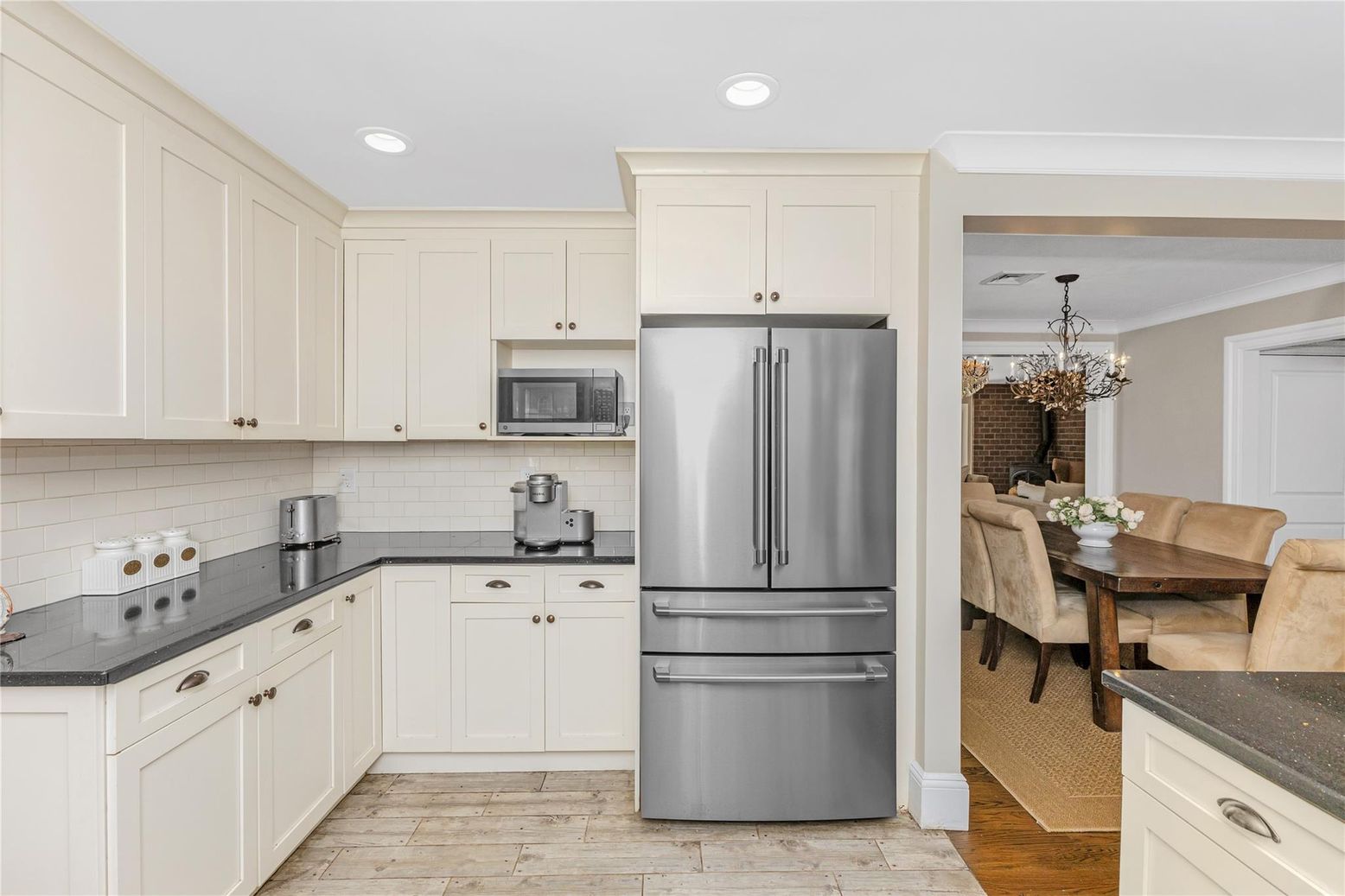Chandelier, Dining room, Interior, Kitchen, Recessed Lighting, Stainless Steel Appliances, Wood Texture Flooring