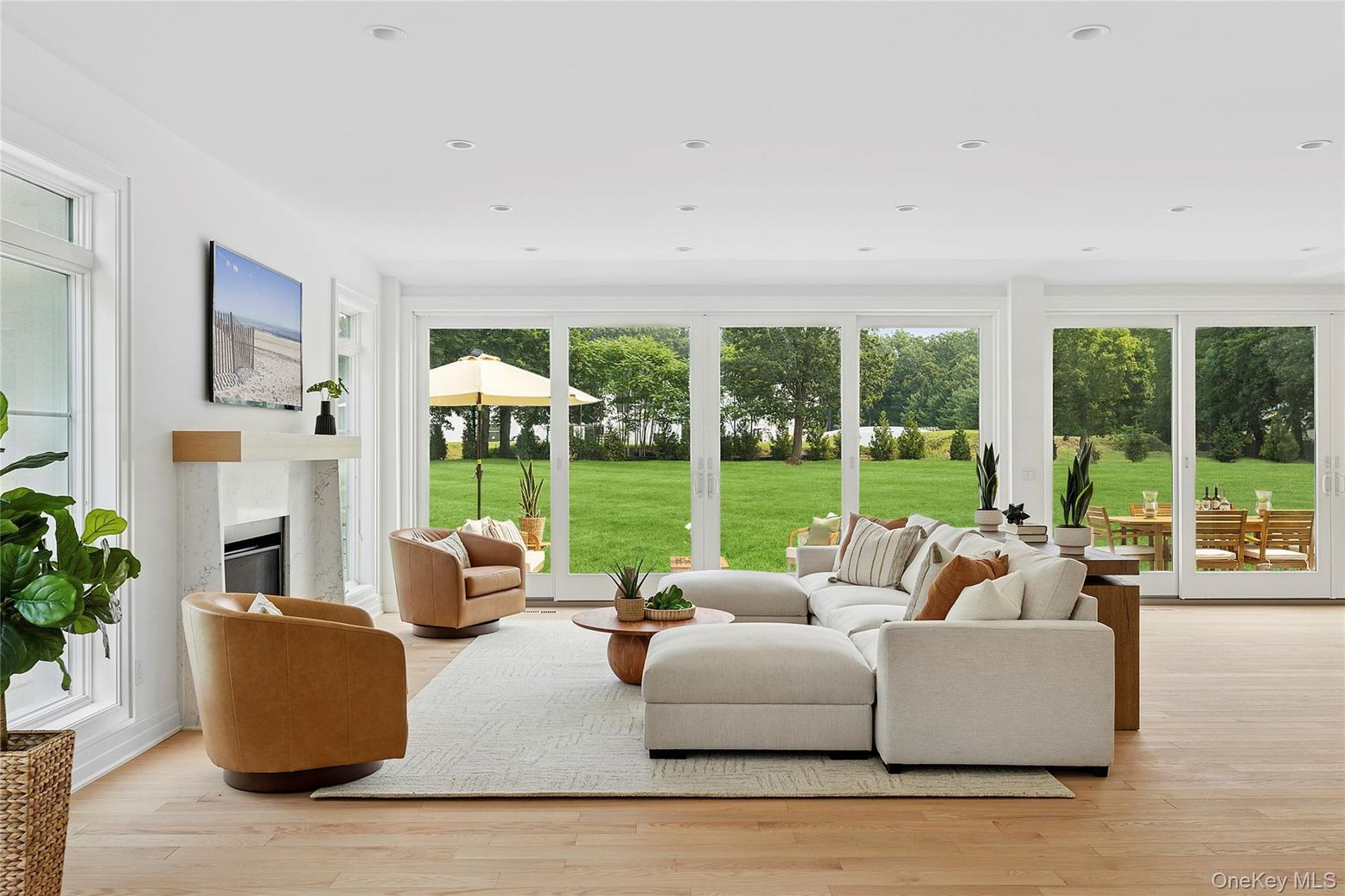 Fireplace, Interior, Living room, Recessed Lighting, Sun Room, Wood Texture Flooring