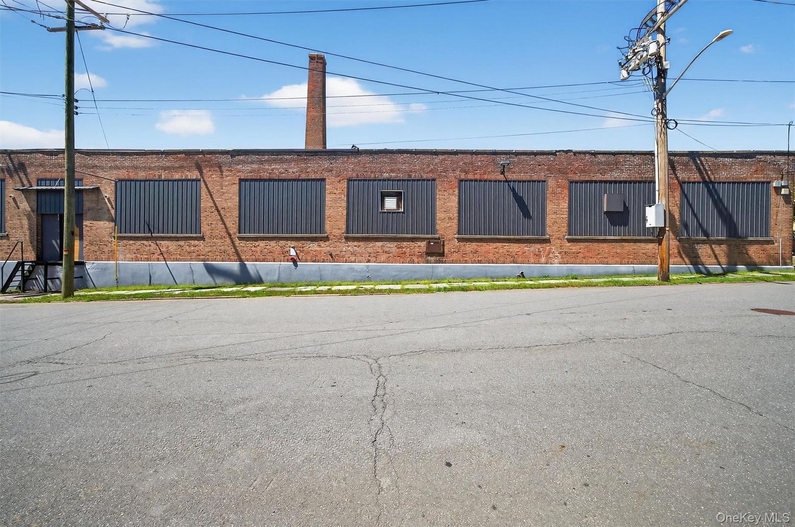 Exterior, Facade, Brick Facade, Cape Cod