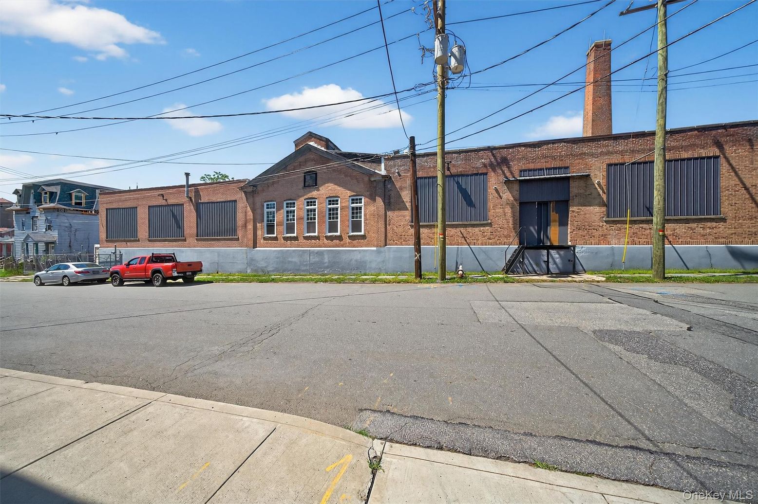 Exterior, Facade, Brick Facade, Condo Building
