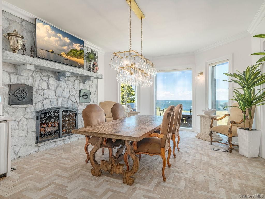 Chandelier, Dining room, Fireplace, Interior, Water, Wood Texture Flooring