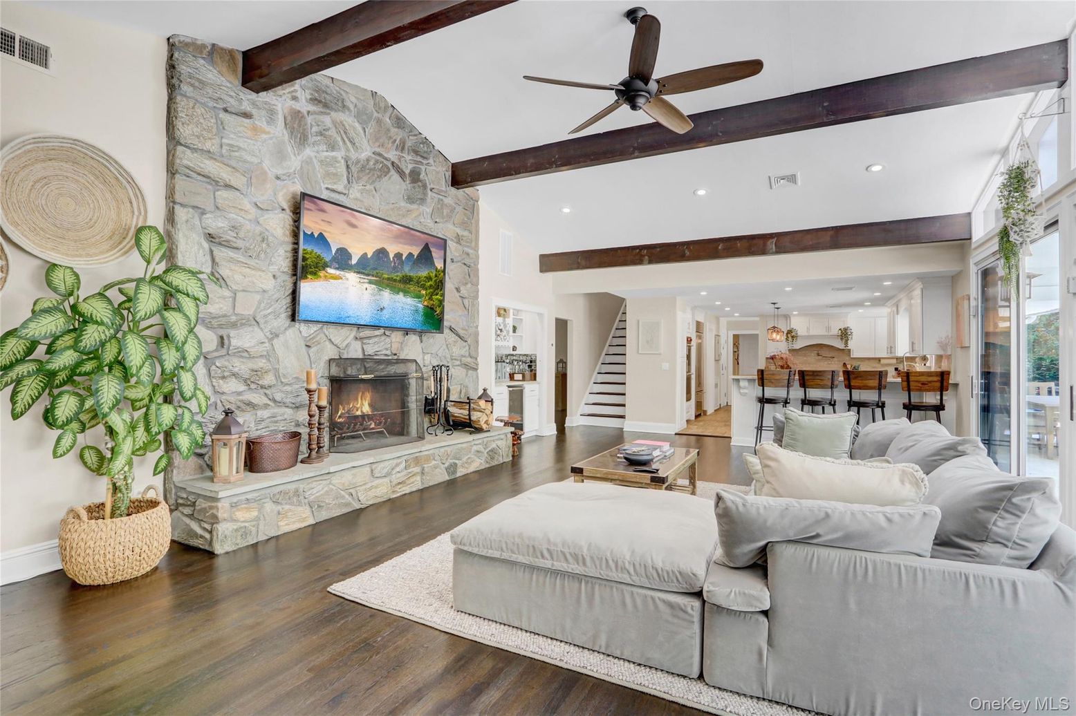 Dining room, Fireplace, Interior, Kitchen, Living room, Pendant Lights, Recessed Lighting, Stone Walls, Wooden Beams, Wood Texture Flooring
