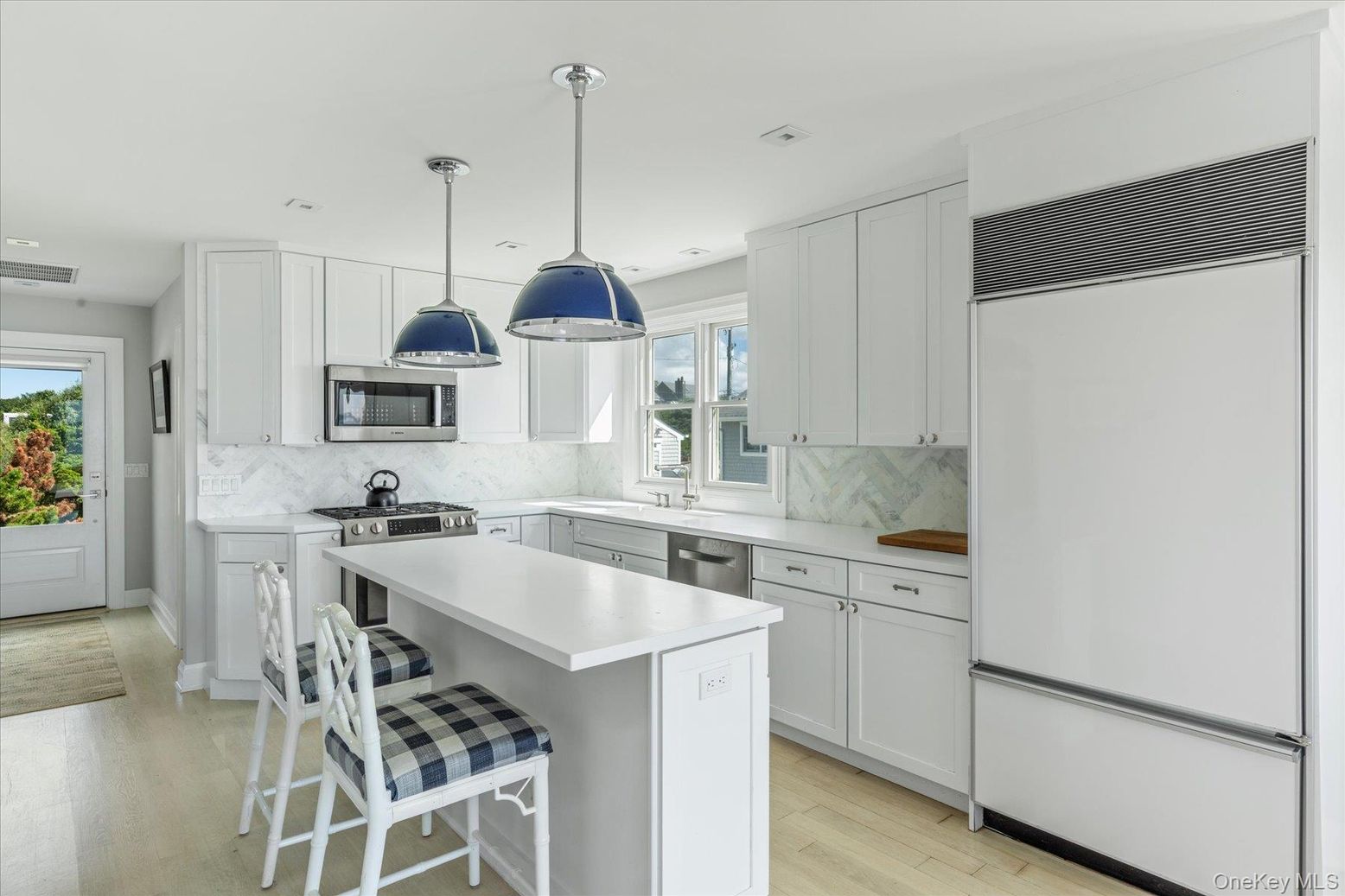 Interior, Kitchen, Marble Walls, Pendant Lights, Recessed Lighting, Stainless Steel Appliances, Wood Texture Flooring