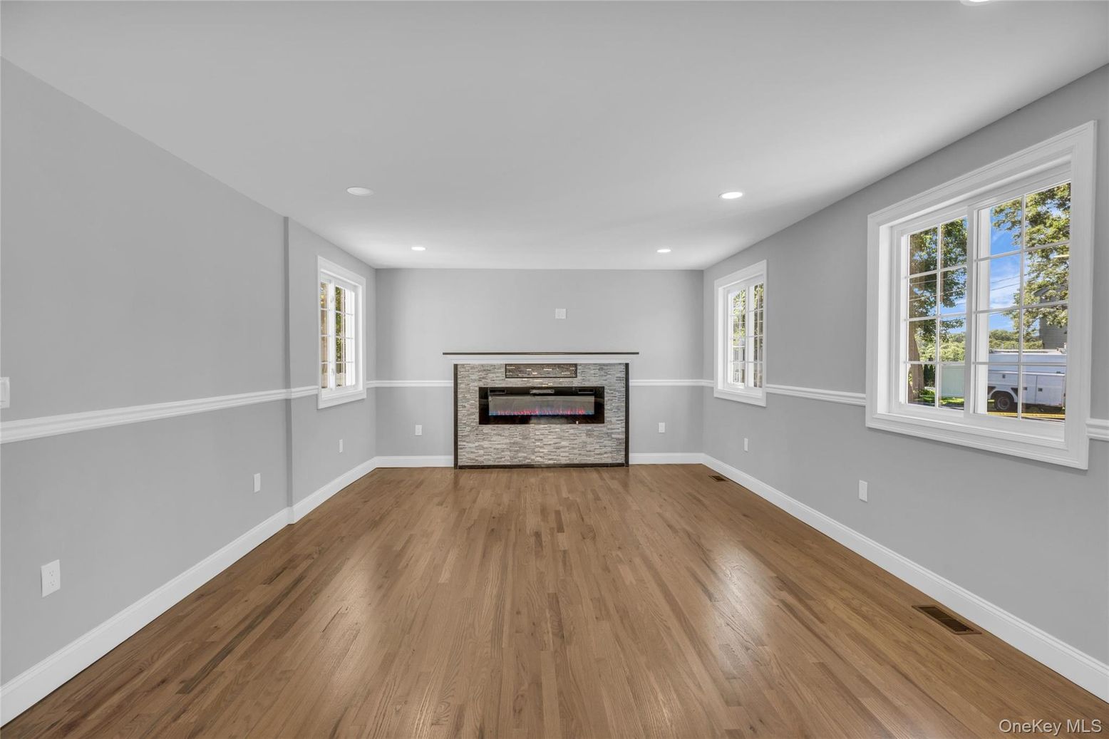 Empty room, Fireplace, Interior, Recessed Lighting, Wood Texture Flooring