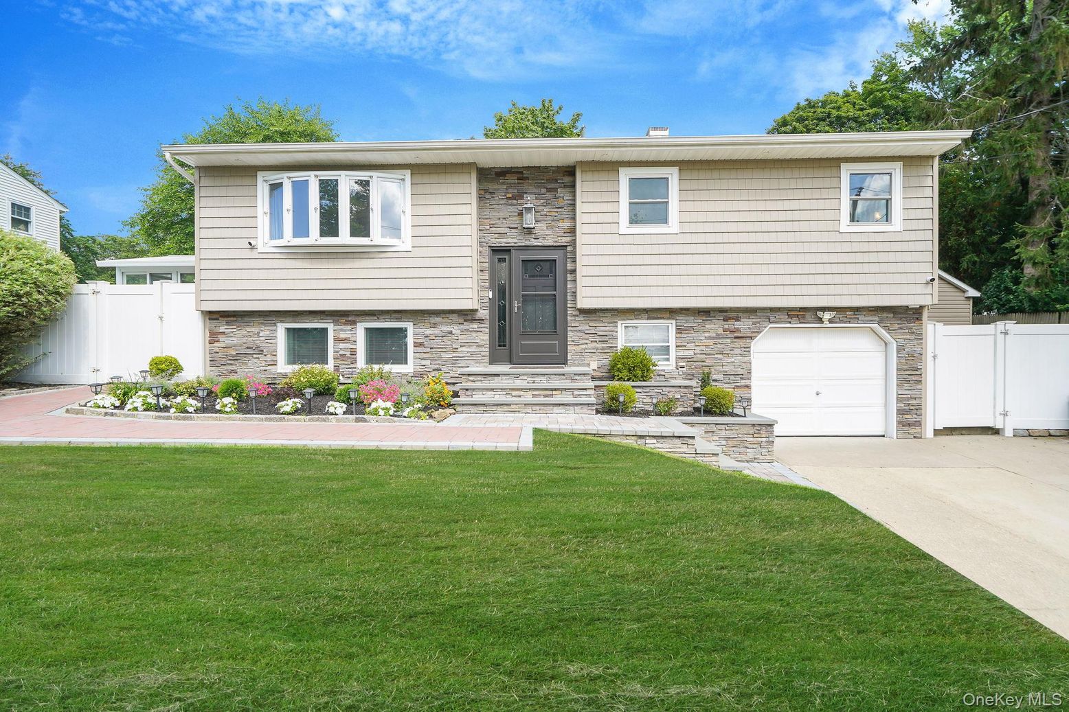 Attached, Exterior, Facade, Raised Ranch