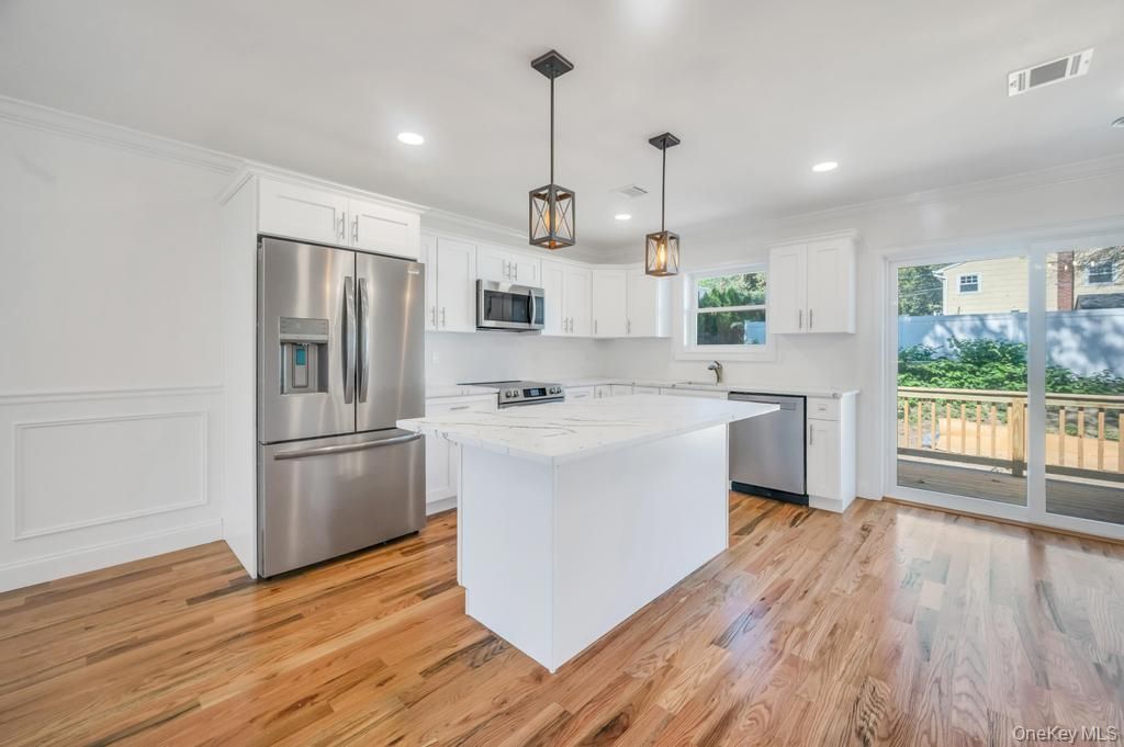 Interior, Kitchen, Pendant Lights, Recessed Lighting, Stainless Steel Appliances, Wood Texture Flooring