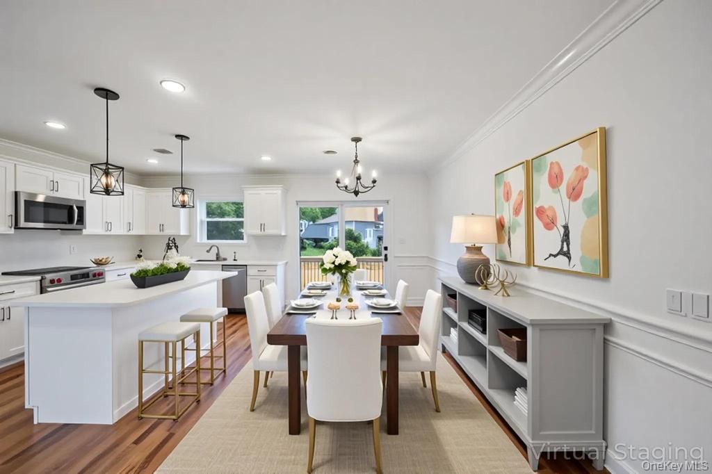 Chandelier, Dining room, Interior, Kitchen, Pendant Lights, Recessed Lighting, Stainless Steel Appliances, Wood Texture Flooring