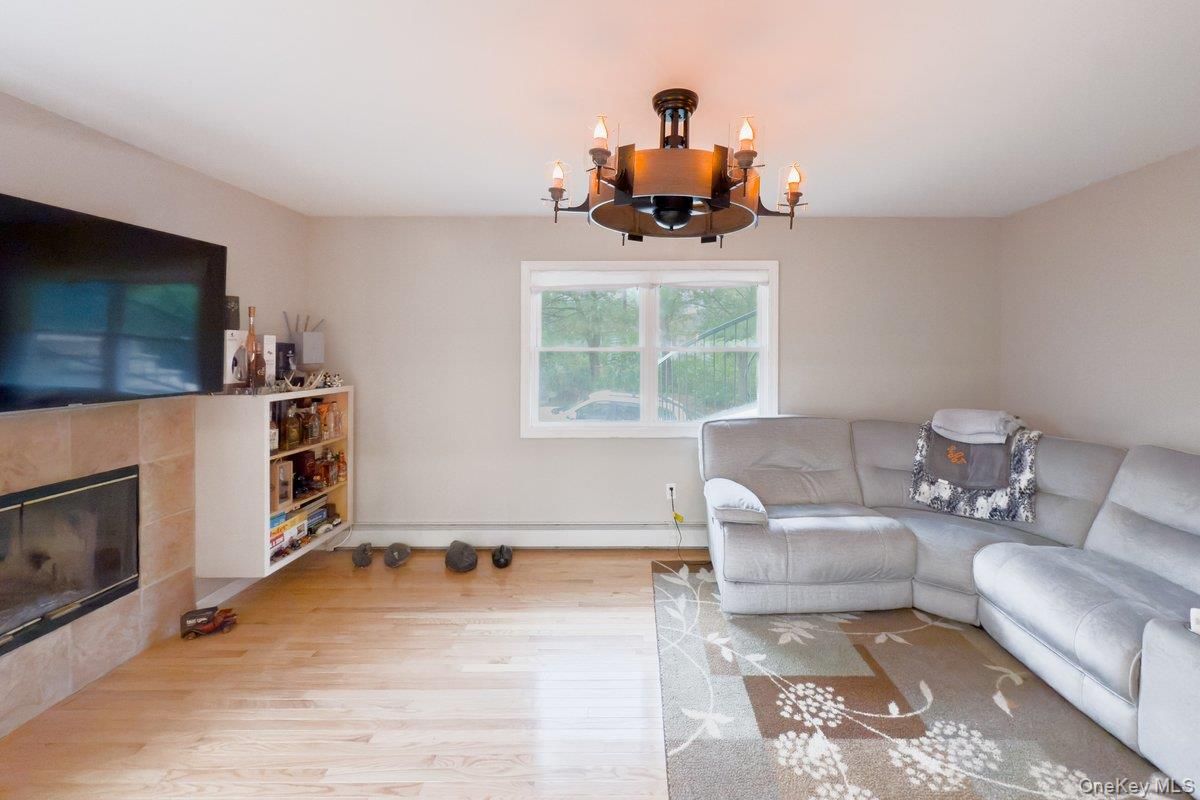 Chandelier, Fireplace, Interior, Living room, Wood Texture Flooring