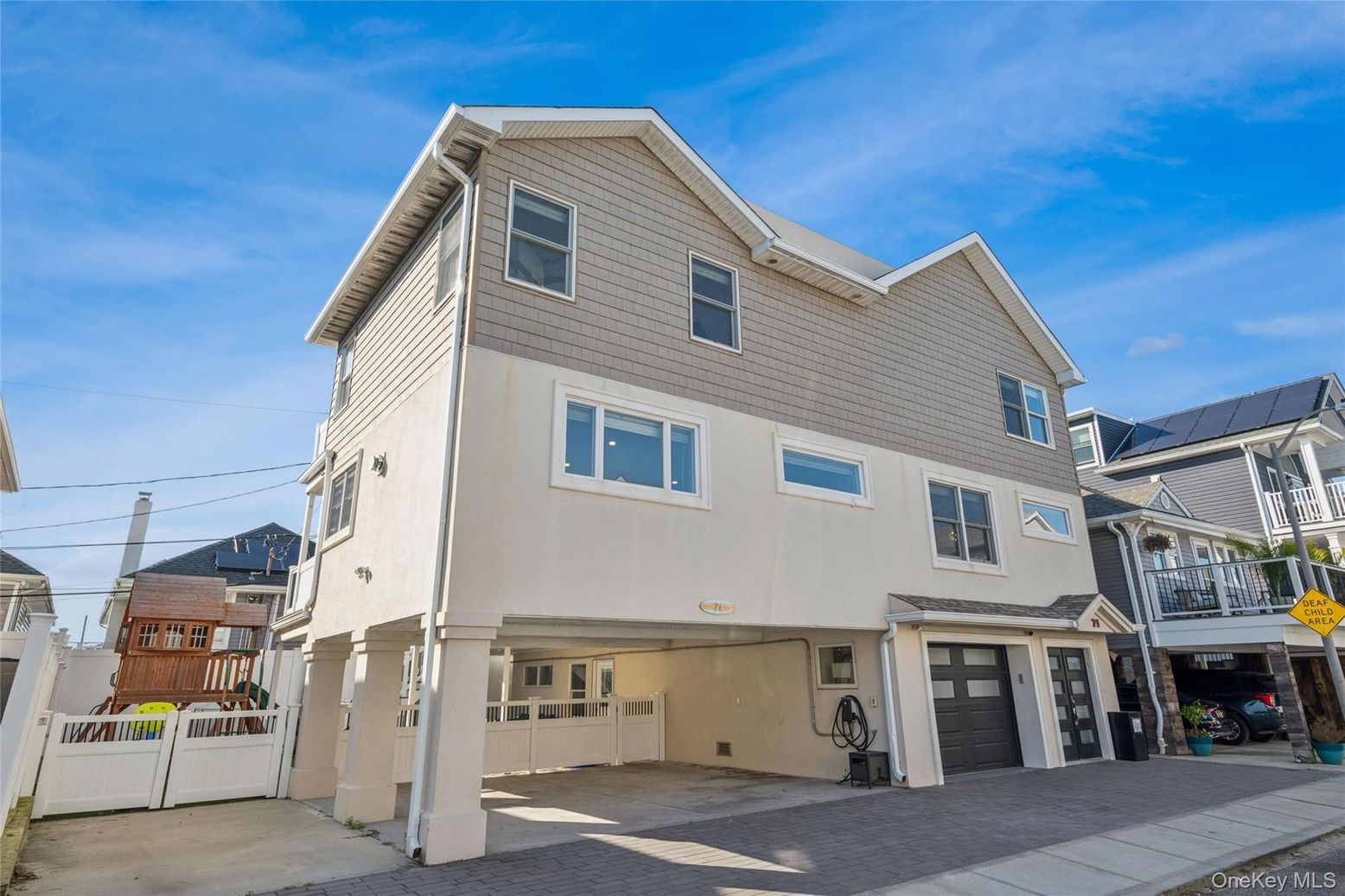 Attached, Exterior, Facade, Solar Panels, Rowhouse