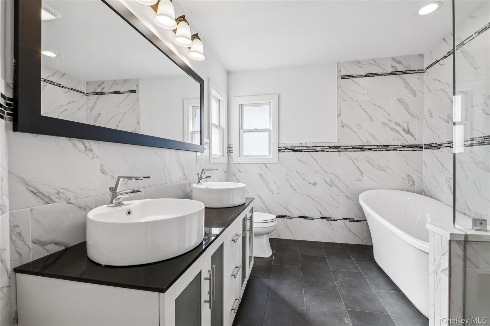 Bathroom, Dual Sink Vanities, Free Standing Baths, Interior, Marble Walls, Recessed Lighting
