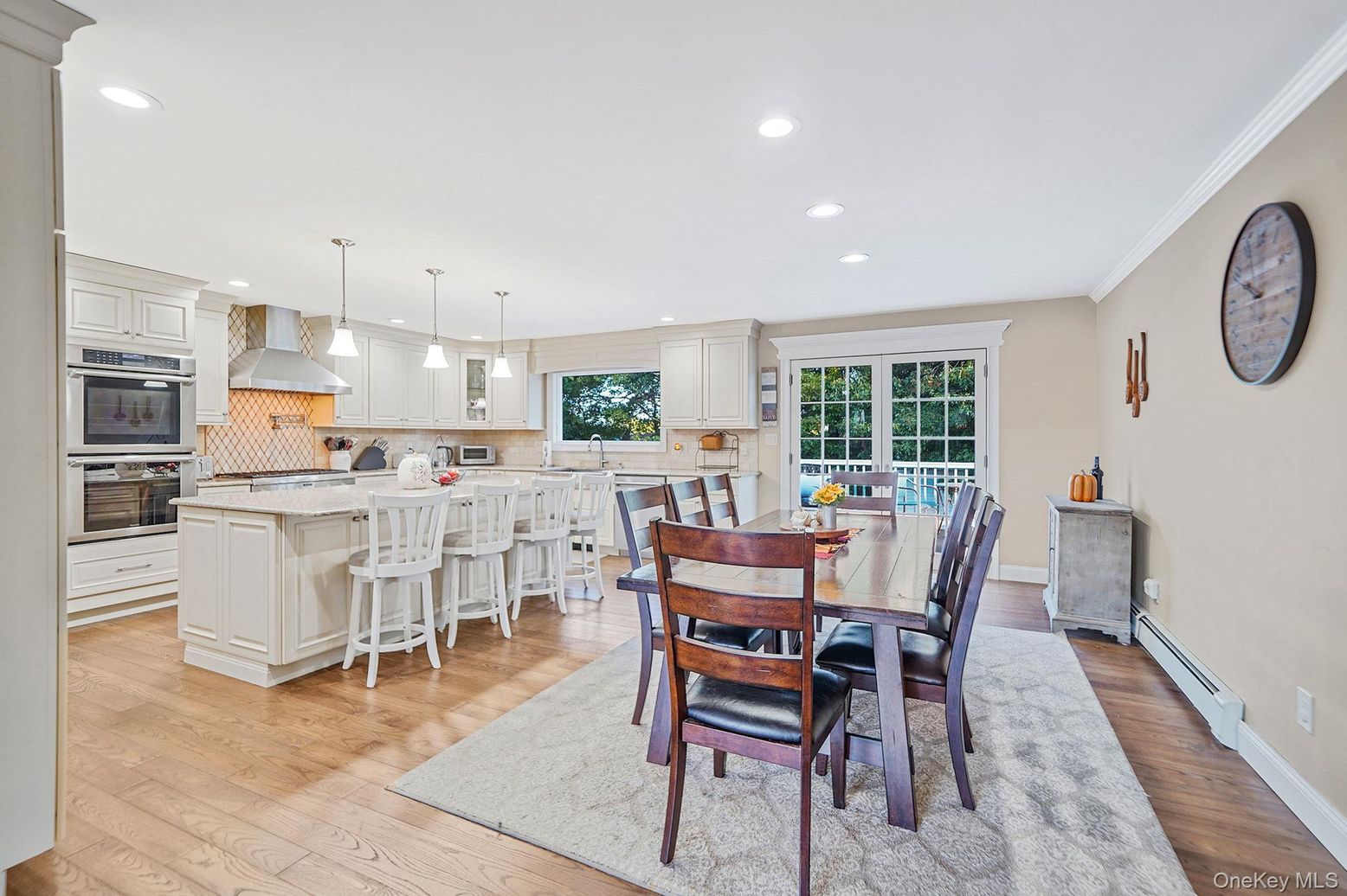 Dining room, Interior, Kitchen, Pendant Lights, Recessed Lighting, Stainless Steel Appliances, Wood Texture Flooring