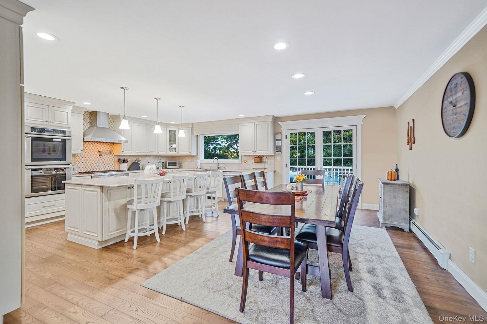 Dining room, Interior, Kitchen, Pendant Lights, Recessed Lighting, Stainless Steel Appliances, Wood Texture Flooring