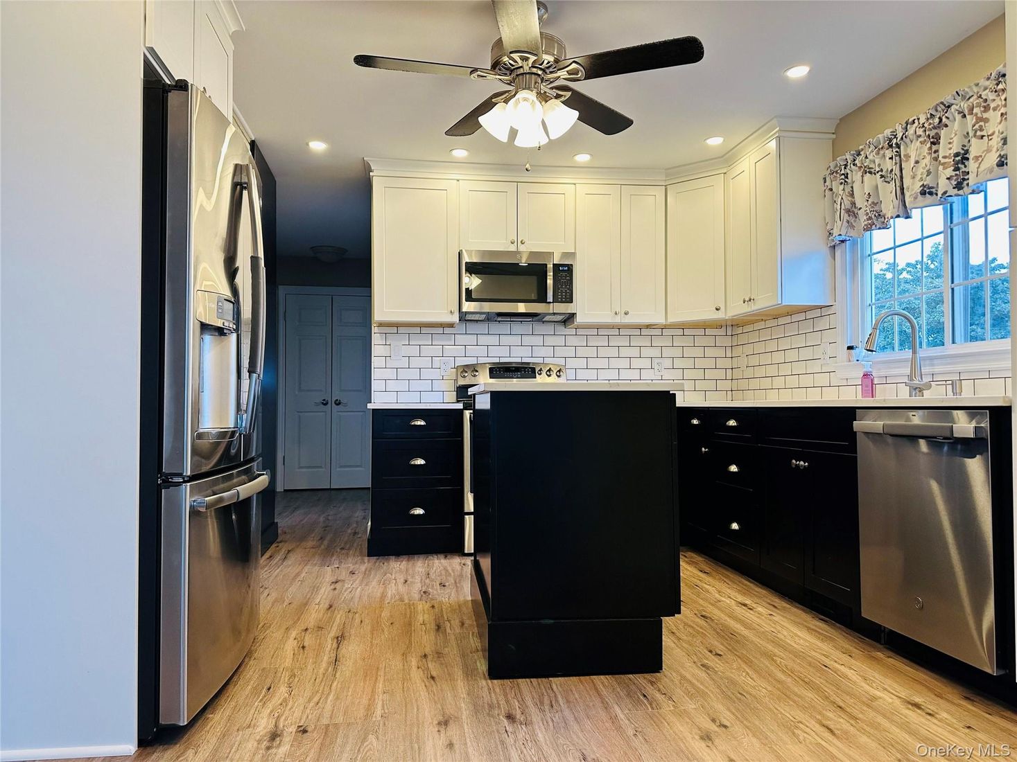 Interior, Kitchen, Recessed Lighting, Stainless Steel Appliances, Tile Countertops, Wood Texture Flooring