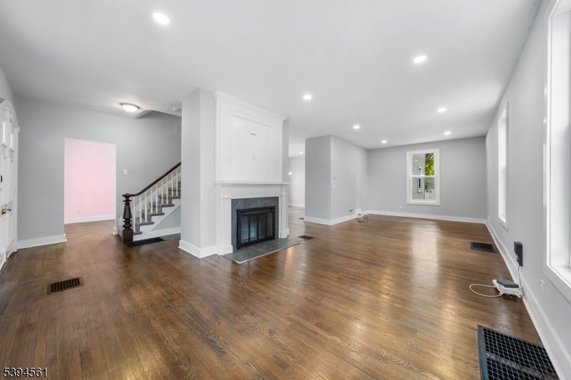 Empty room, Fireplace, Interior, Recessed Lighting, Wood Texture Flooring