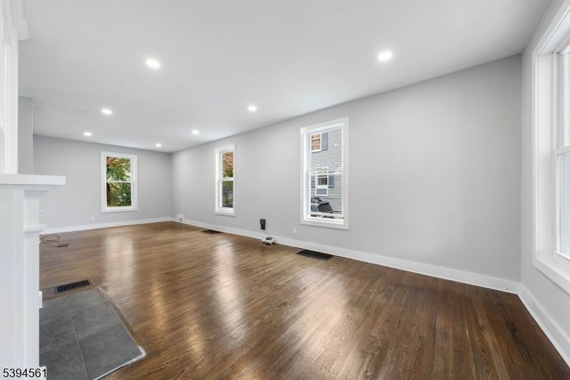 Empty room, Fireplace, Interior, Recessed Lighting, Wood Texture Flooring
