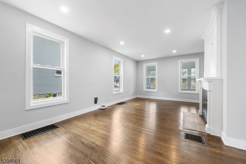 Empty room, Fireplace, Interior, Recessed Lighting, Wood Texture Flooring