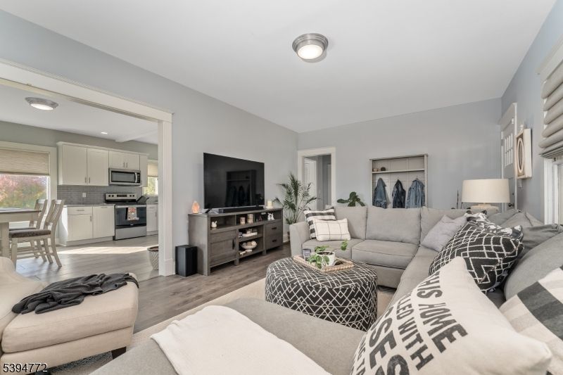 Dining room, Interior, Kitchen, Living room, Recessed Lighting, Stainless Steel Appliances, Wood Texture Flooring