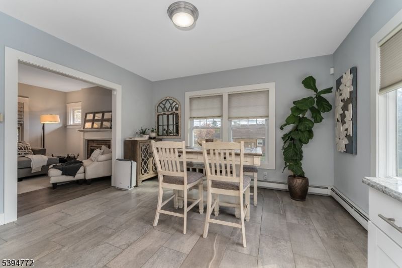 Dining room, Fireplace, Interior, Living room, Wood Texture Flooring