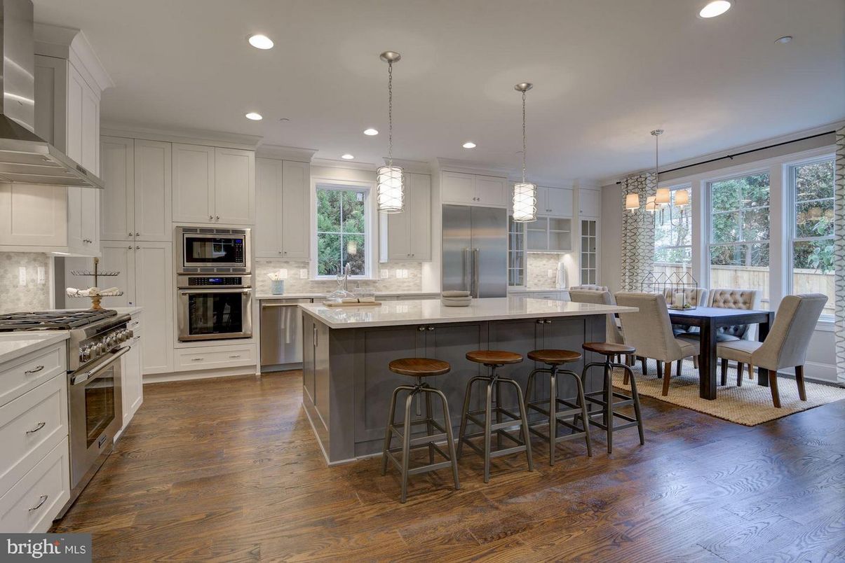 Chandelier, Dining room, Interior, Kitchen, Pendant Lights, Recessed Lighting, Stainless Steel Appliances, Wood Texture Flooring