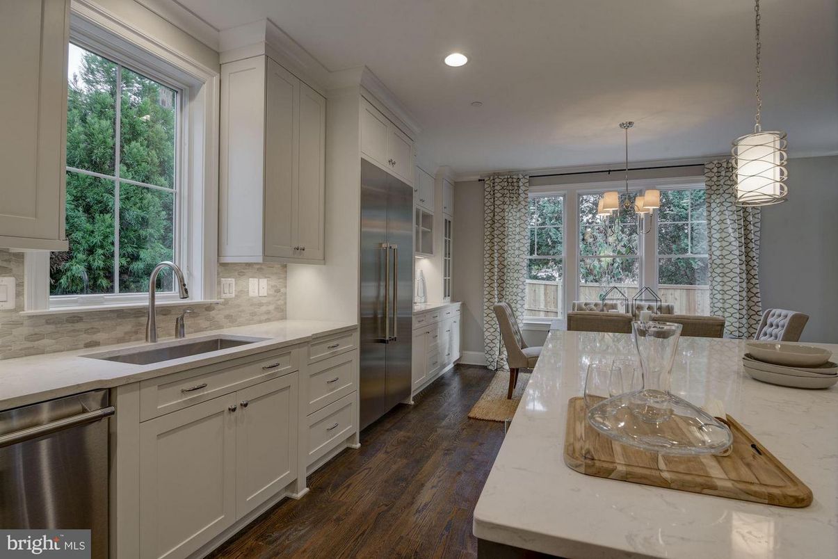 Dining room, Interior, Kitchen, Pendant Lights, Recessed Lighting, Stainless Steel Appliances, Wood Texture Flooring