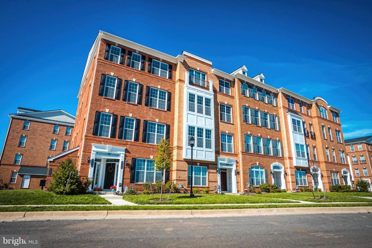 Exterior, Facade, Brick Facade, Condo Building