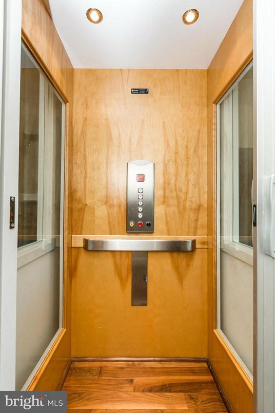 Elevator, Interior, Recessed Lighting, Wood Texture Flooring, Wooden Walls