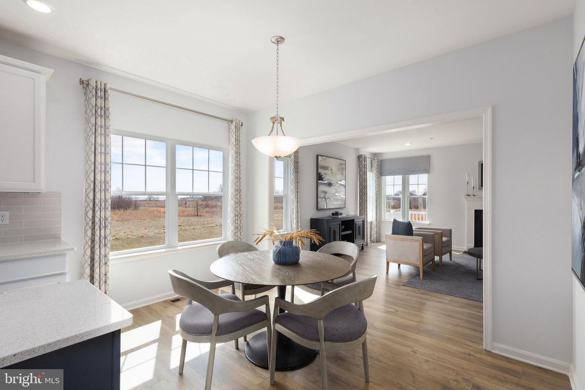 Dining room, Fireplace, Interior, Living room, Pendant Lights, Recessed Lighting, Wood Texture Flooring