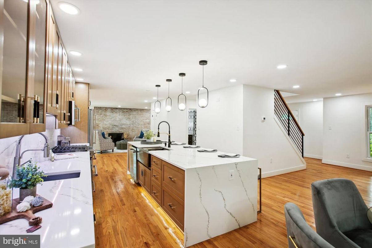 Interior, Kitchen, Pendant Lights, Recessed Lighting, Stainless Steel Appliances, Stone Walls, Wood Texture Flooring
