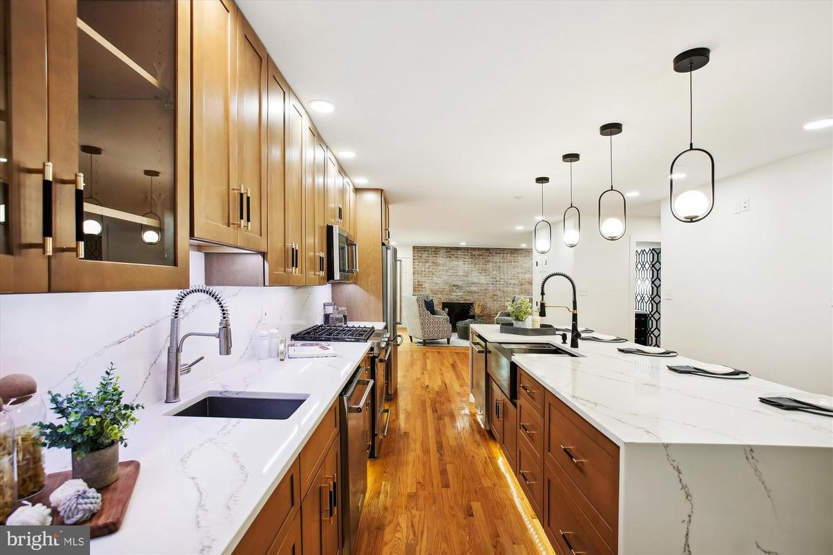 Interior, Kitchen, Pendant Lights, Recessed Lighting, Stainless Steel Appliances, Stone Walls, Wood Texture Flooring